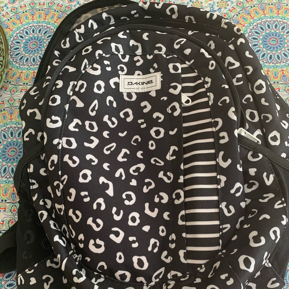 Dakine black and white cheeta/leopard backpack